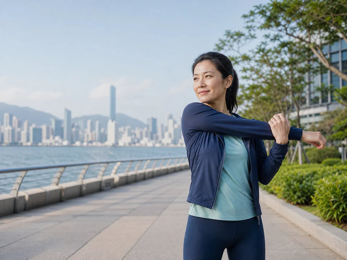 Hong Kong woman stretching during an outdoor waterfront walk